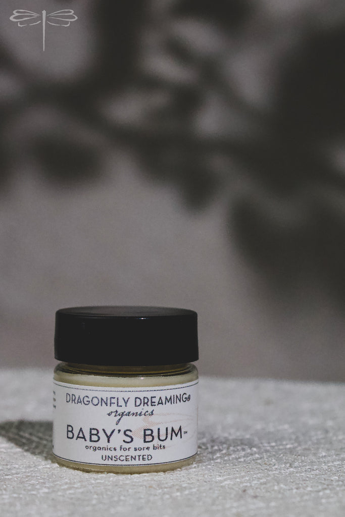Pictured here, Baby's Bum Scent-Free Calendula Salve by Dragonfly Dreaming Organics